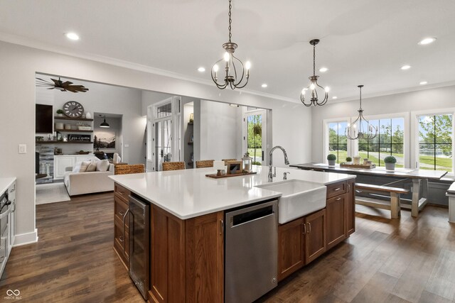 4808 Lakeview Dr, Greenwood, IN 46143 - kitchen with dishwasher, a sink, beverage cooler, a chandelier, and recessed lighting