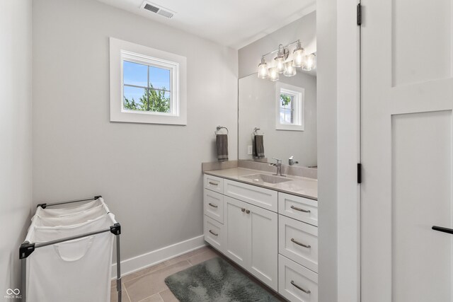 4808 Lakeview Dr, Greenwood, IN 46143 - bathroom with vanity, baseboards, and tile patterned flooring