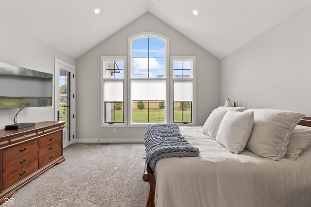 4808 Lakeview Dr, Greenwood, IN 46143 - bedroom with light carpet, multiple windows, lofted ceiling, baseboards, and recessed lighting