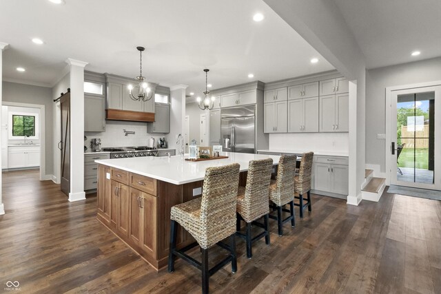 4808 Lakeview Dr, Greenwood, IN 46143 - kitchen featuring stainless steel built in refrigerator, recessed lighting, healthy amount of natural light, dark wood-type flooring, and ornamental molding