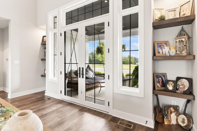 4808 Lakeview Dr, Greenwood, IN 46143 - doorway with wood finished floors and baseboards