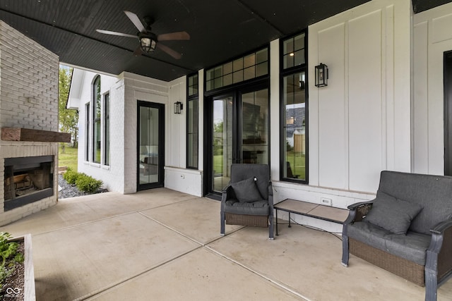 4808 Lakeview Dr, Greenwood, IN 46143 - view of patio / terrace with an outdoor brick fireplace and a ceiling fan