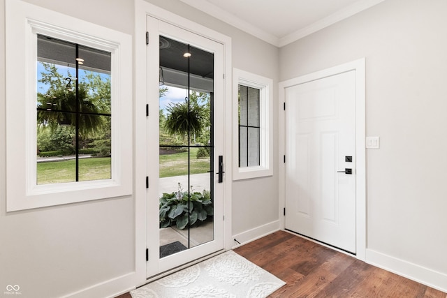 4808 Lakeview Dr, Greenwood, IN 46143 - entryway with dark wood-type flooring, crown molding, and baseboards