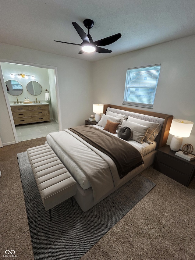 1653 Wade St, Indianapolis, IN 46203 - bedroom featuring carpet flooring, connected bathroom, and ceiling fan