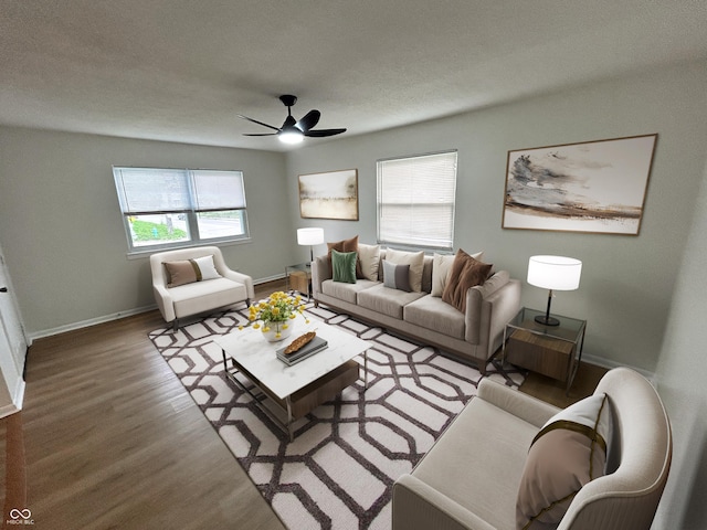 1653 Wade St, Indianapolis, IN 46203 - living area featuring wood finished floors, a ceiling fan, baseboards, and a textured ceiling