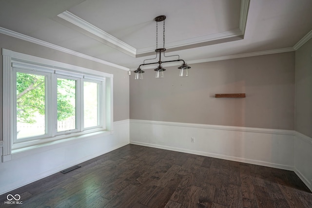4949 Jennings Dr, Carmel, IN 46033 - spare room featuring a tray ceiling, dark wood finished floors, crown molding, and baseboards