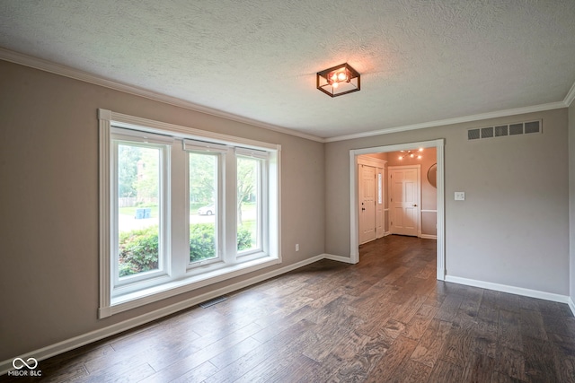 4949 Jennings Dr, Carmel, IN 46033 - unfurnished room featuring dark wood-type flooring, baseboards, crown molding, and a textured ceiling