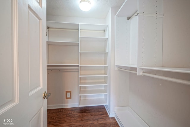 4949 Jennings Dr, Carmel, IN 46033 - walk in closet with wood finished floors
