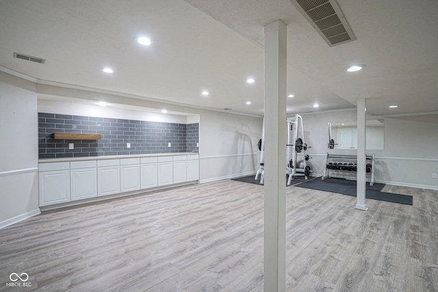 4949 Jennings Dr, Carmel, IN 46033 - exercise area with light wood-type flooring, recessed lighting, baseboards, and crown molding