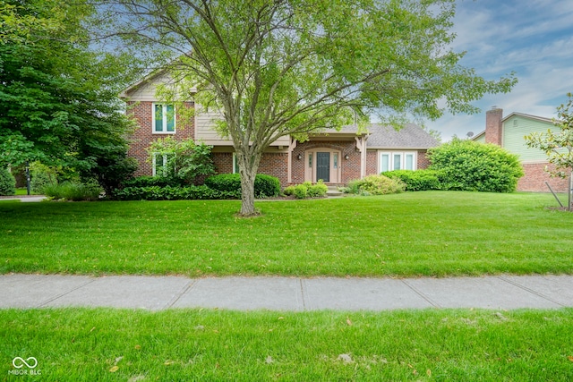 4949 Jennings Dr, Carmel, IN 46033 - view of front facade with brick siding and a front lawn
