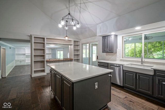 4949 Jennings Dr, Carmel, IN 46033 - kitchen with stainless steel dishwasher, high vaulted ceiling, a sink, a center island, and dark wood-type flooring