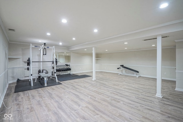 4949 Jennings Dr, Carmel, IN 46033 - exercise room featuring ornamental molding, wood finished floors, baseboards, and recessed lighting