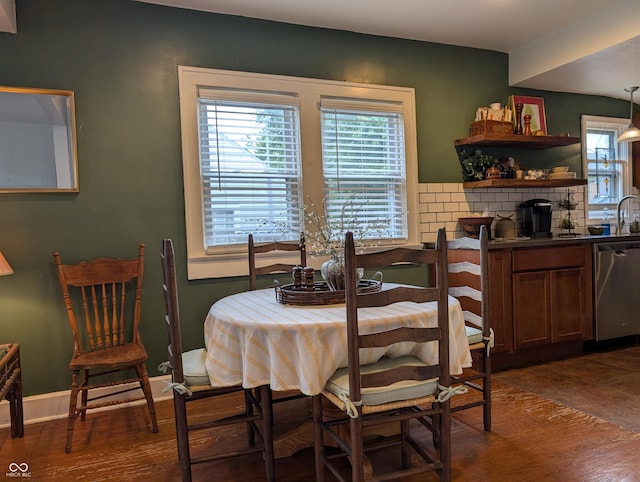 1728 Newton St, Columbus, IN 47201 - dining area with dark wood finished floors and plenty of natural light