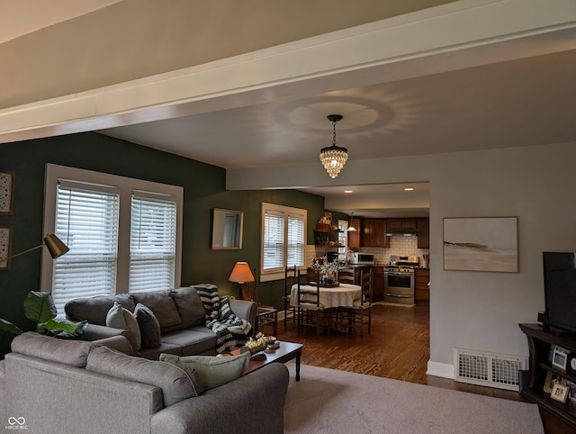 1728 Newton St, Columbus, IN 47201 - living area with dark wood-type flooring, a chandelier, and recessed lighting