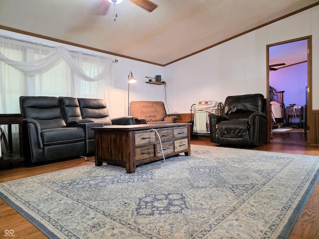 8310 Dog Trot Ln, Morgantown, IN 46160 - living area featuring lofted ceiling, crown molding, a ceiling fan, and wood finished floors
