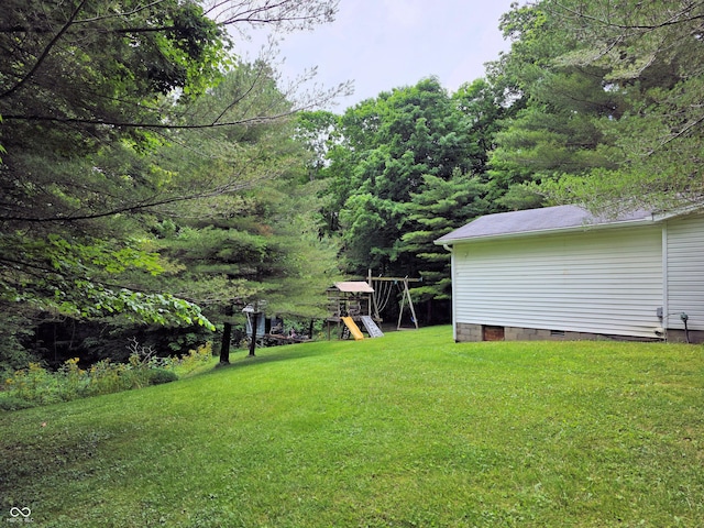 8310 Dog Trot Ln, Morgantown, IN 46160 - view of green lawn with a playground
