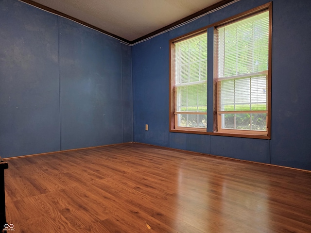 8310 Dog Trot Ln, Morgantown, IN 46160 - spare room with wood finished floors and ornamental molding