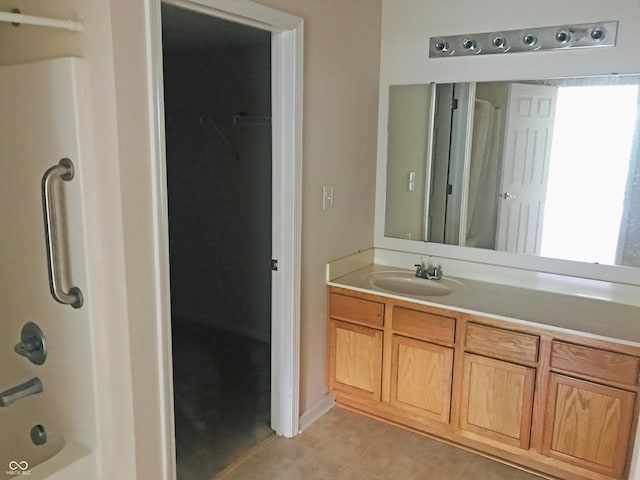 855 Gazebo Way Unit C, Greenwood, IN 46142 - bathroom with tile patterned flooring, vanity, and shower / bath combination with curtain