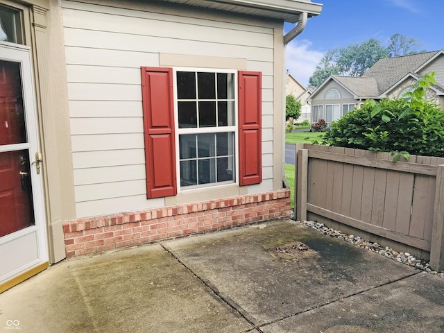 855 Gazebo Way Unit C, Greenwood, IN 46142 - view of side of home featuring a patio and brick siding