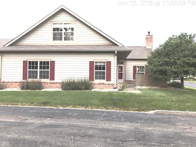 855 Gazebo Way Unit C, Greenwood, IN 46142 - view of front of home with a chimney, brick siding, and a front yard