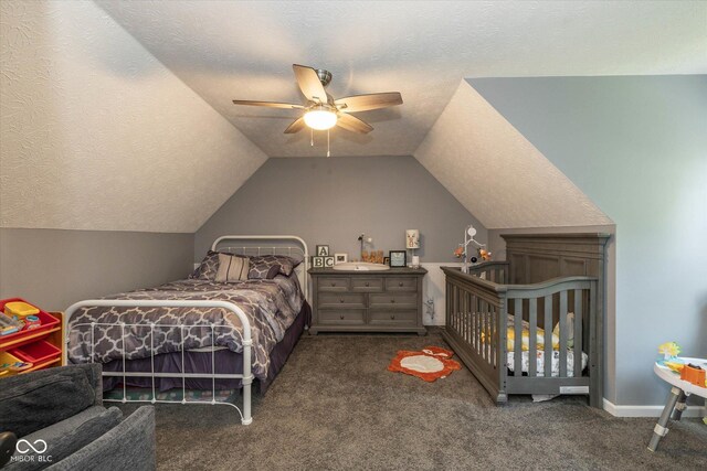 1135 W Wildflower Ct, Mooresville, IN 46158 - bedroom with carpet floors, a textured ceiling, vaulted ceiling, and a ceiling fan