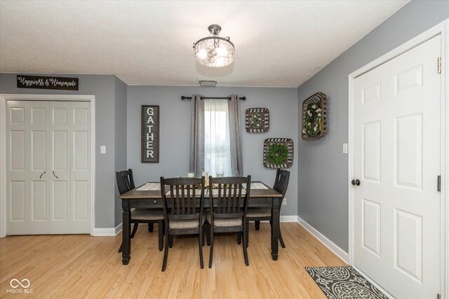 1135 W Wildflower Ct, Mooresville, IN 46158 - dining space featuring light wood-type flooring and baseboards