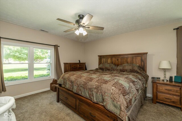 1135 W Wildflower Ct, Mooresville, IN 46158 - bedroom featuring light colored carpet, baseboards, and ceiling fan