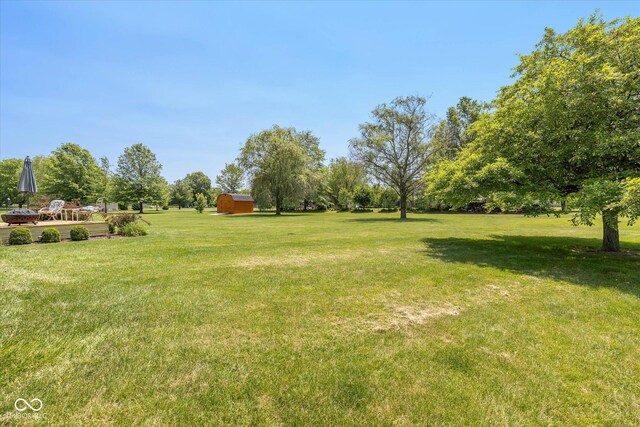 1135 W Wildflower Ct, Mooresville, IN 46158 - view of grassy yard featuring an outbuilding
