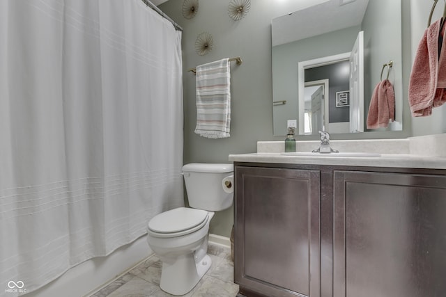 933 Curlew Ln, Greenwood, IN 46143 - full bath with toilet, vanity, shower / bath combo with shower curtain, baseboards, and marble look tiles