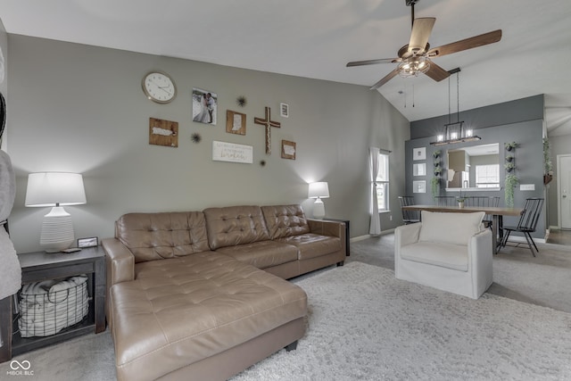 933 Curlew Ln, Greenwood, IN 46143 - living area featuring ceiling fan, lofted ceiling, carpet flooring, and baseboards