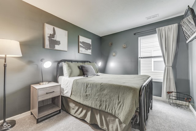 933 Curlew Ln, Greenwood, IN 46143 - bedroom with light colored carpet and baseboards