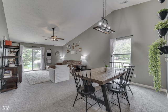 933 Curlew Ln, Greenwood, IN 46143 - dining area with carpet floors, ceiling fan, high vaulted ceiling, and baseboards