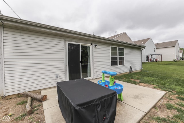 933 Curlew Ln, Greenwood, IN 46143 - rear view of house with a patio and a lawn