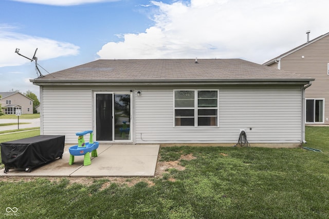 933 Curlew Ln, Greenwood, IN 46143 - rear view of house with a patio, a lawn, and roof with shingles