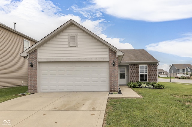 933 Curlew Ln, Greenwood, IN 46143 - view of front of house featuring brick siding, driveway, a front lawn, and roof with shingles