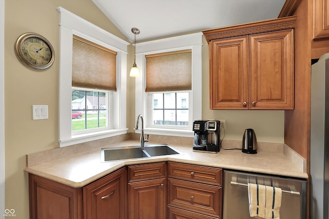 203 N Cross St, Hillsboro, IN 47949 - kitchen featuring vaulted ceiling, light countertops, brown cabinets, hanging light fixtures, and stainless steel appliances
