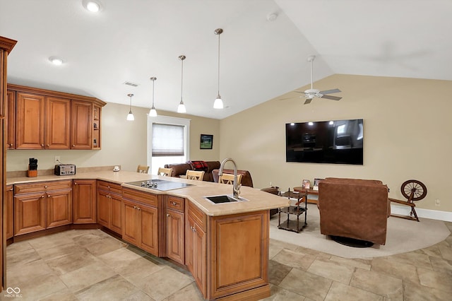 203 N Cross St, Hillsboro, IN 47949 - kitchen with black electric cooktop, light countertops, lofted ceiling, open floor plan, and a peninsula
