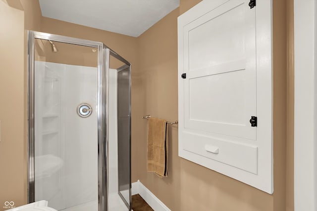 203 N Cross St, Hillsboro, IN 47949 - full bath with a shower stall and baseboards