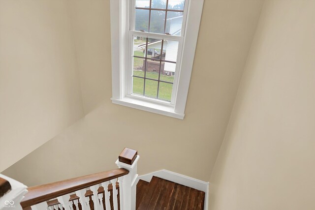 203 N Cross St, Hillsboro, IN 47949 - staircase with wood finished floors and baseboards