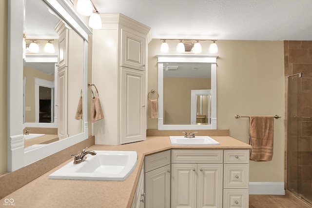 203 N Cross St, Hillsboro, IN 47949 - full bath featuring double vanity, a tile shower, and tile patterned flooring