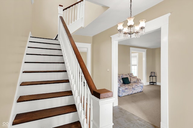 203 N Cross St, Hillsboro, IN 47949 - staircase with a chandelier and carpet
