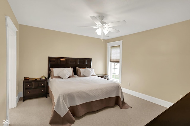203 N Cross St, Hillsboro, IN 47949 - bedroom with light colored carpet and a ceiling fan