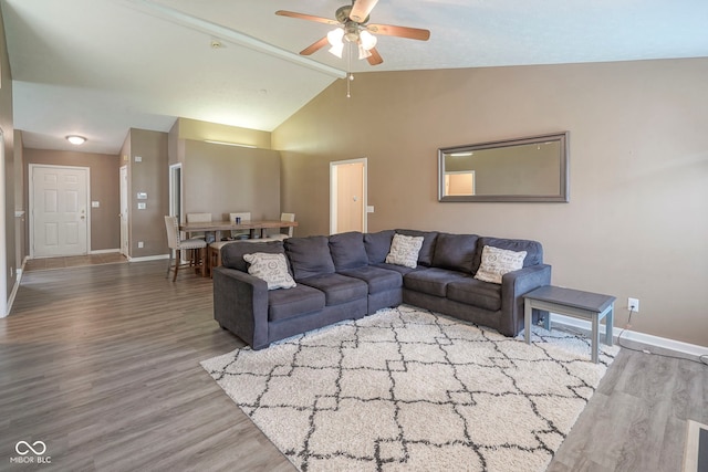 7724 Blackthorn Dr, Indianapolis, IN 46236 - living area featuring baseboards, a ceiling fan, and wood finished floors
