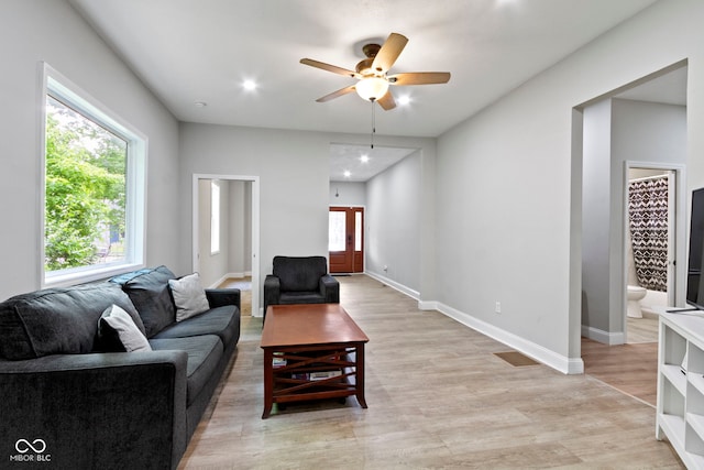 1150 W 30th St, Indianapolis, IN 46208 - living area with ceiling fan, light wood-style floors, baseboards, and recessed lighting