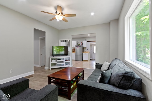 1150 W 30th St, Indianapolis, IN 46208 - living area featuring ceiling fan, light wood-style floors, baseboards, and recessed lighting