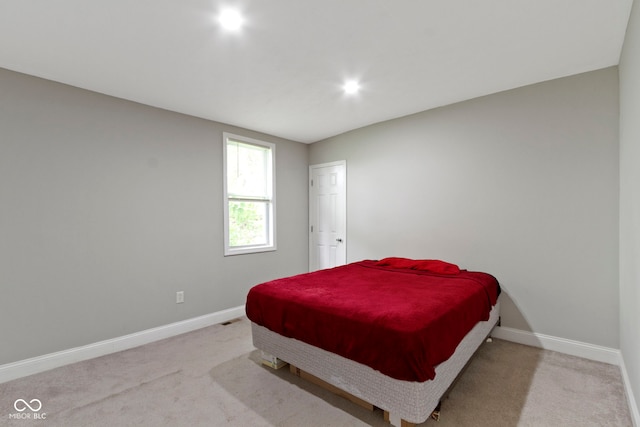 1150 W 30th St, Indianapolis, IN 46208 - carpeted bedroom with baseboards and recessed lighting