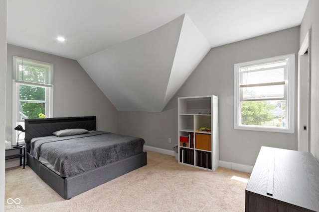 1150 W 30th St, Indianapolis, IN 46208 - bedroom with baseboards, carpet floors, and vaulted ceiling