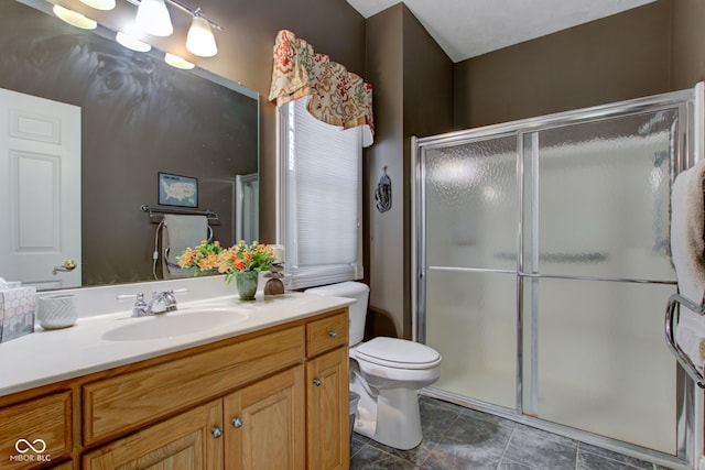 3533 Alexandria Pike, Anderson, IN 46012 - bathroom featuring vanity, a stall shower, and toilet