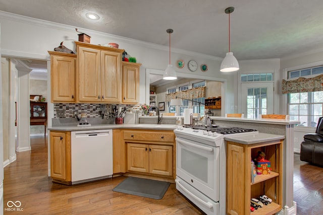 3533 Alexandria Pike, Anderson, IN 46012 - kitchen with white appliances, a sink, a peninsula, light countertops, and crown molding