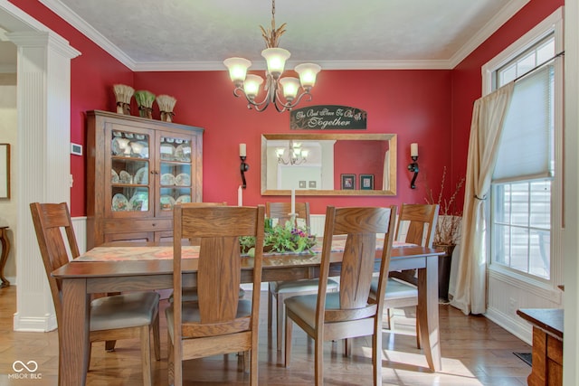 3533 Alexandria Pike, Anderson, IN 46012 - dining area featuring a chandelier, wood finished floors, ornamental molding, and baseboards